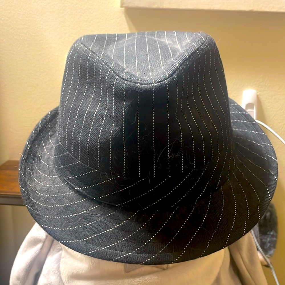 Women’s Hat. Size Small inside measurement is 20” Black with white pinstripes